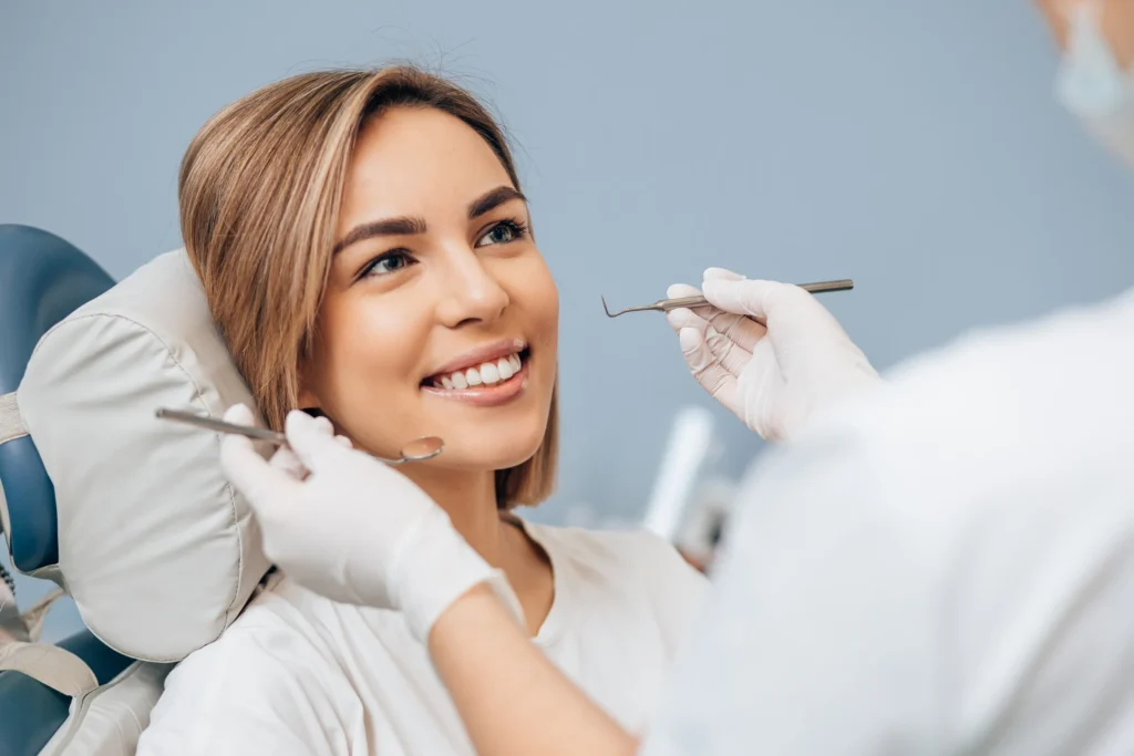 Smiling woman in a dental chair before an exam