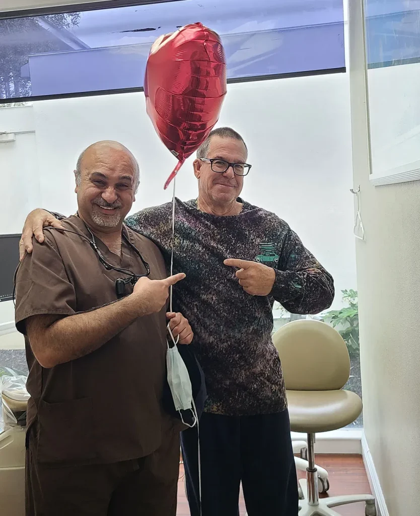 Dr. Haroonian with a patient