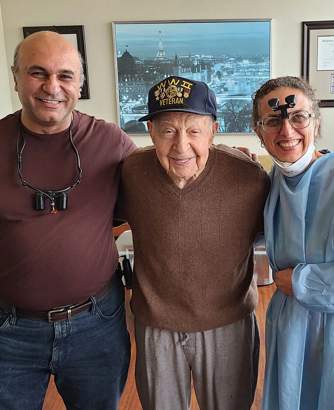 Dr. Haroonian and a team member with a veteran patient